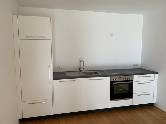 Schöne Gartenwohnung mit Garten, Terrasse und Tiefgaragenplatz!