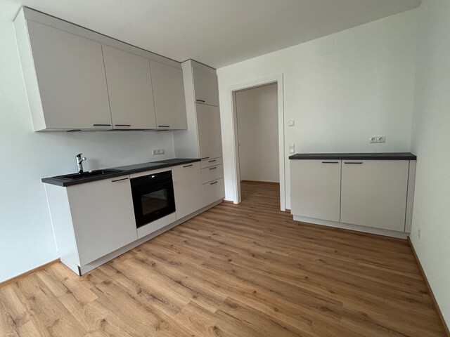 Attraktive Neubauwohnungen in saniertem Wohn- und Geschäftshaus