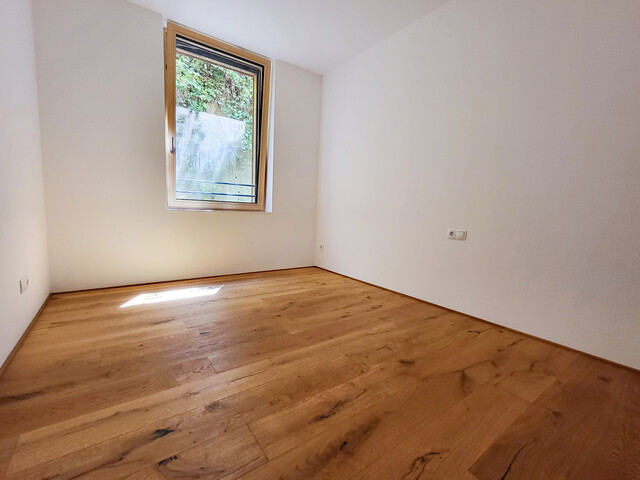 Hochwertige Gartenwohnung in Neubau (2023)