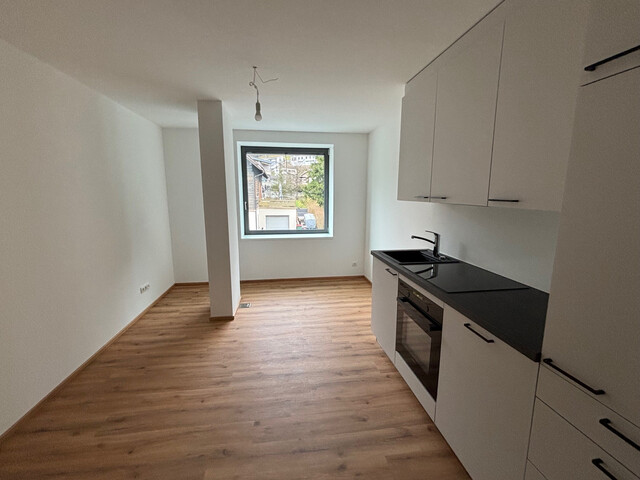 Attraktive Neubauwohnungen in saniertem Wohn- und Geschäftshaus