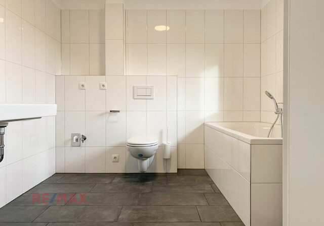 Top-moderne Wohnung in Zweifamilienhaus – Privatsphäre inklusive