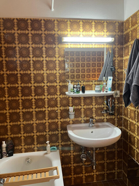 Gepflegte Dachgeschosswohnung mit Garage, Balkon und Keller in zentraler Lage!