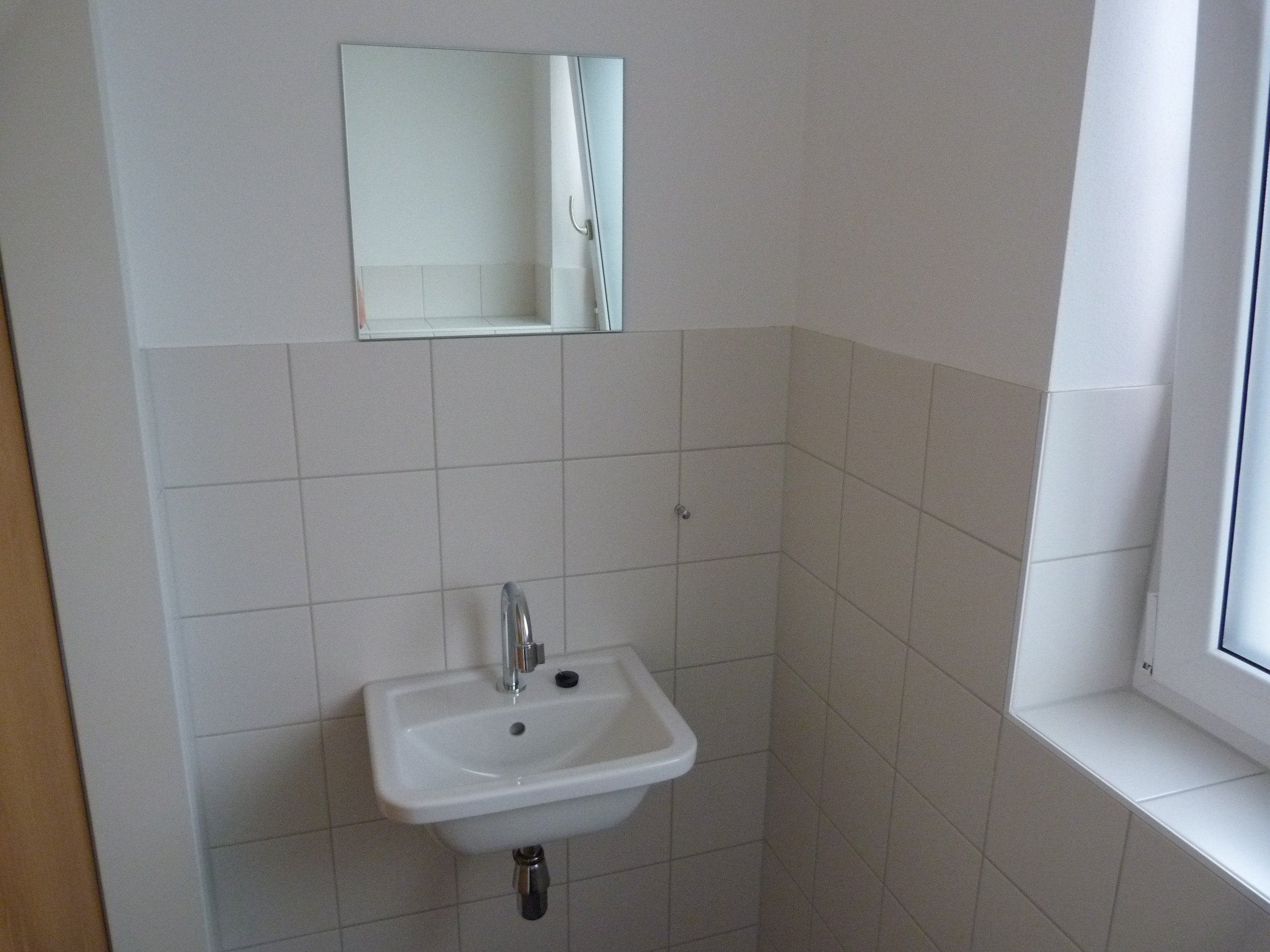 2-Zimmer-Wohnung mit 61 m² + 23 m² überdachte Terrasse, Carportplatz