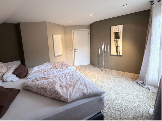 Nüziders: Einfamilienhaus mit Garten - Premium-Immobilie – Wohnjuwel mit Wintergarten, Wellnessbereich & Traumgarten