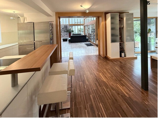 Nüziders: Einfamilienhaus mit Garten - Premium-Immobilie – Wohnjuwel mit Wintergarten, Wellnessbereich & Traumgarten