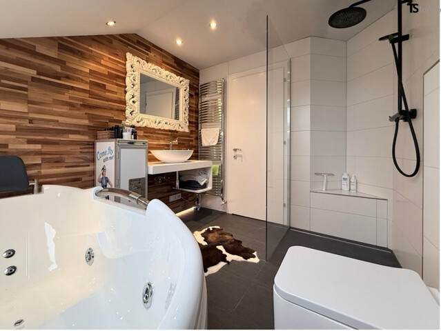 Nüziders: Einfamilienhaus mit Garten - Premium-Immobilie – Wohnjuwel mit Wintergarten, Wellnessbereich & Traumgarten