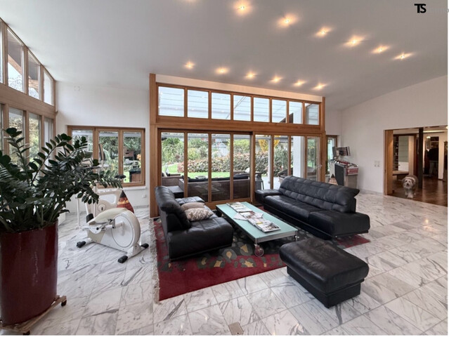 Nüziders: Einfamilienhaus mit Garten - Premium-Immobilie – Wohnjuwel mit Wintergarten, Wellnessbereich & Traumgarten