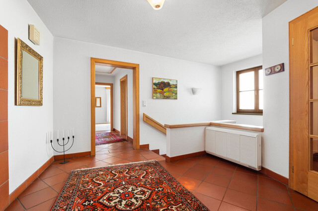 Kaminfeuer & Panoramablick: das Ried von der Terrasse aus genießen