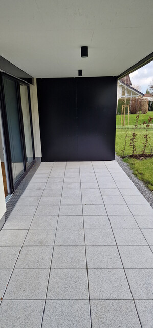 Neubau Gartenwohnung mit 20 m² Terrasse, 70 m² Garten,  6 m² Kellerabteil, 1 Tiefgaragenstellplatz à 20.000,00 e (Kauf)