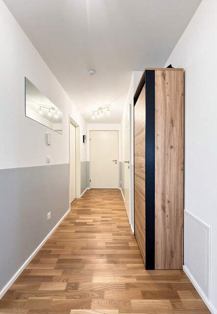 Erstklassiges Wohnerlebnis mit Garten, Stil und zwei Tiefgaragenplätzen