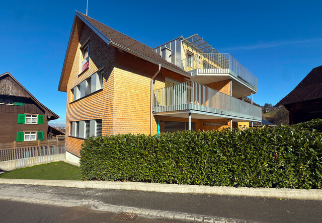 Erstklassiges Wohnerlebnis mit Garten, Stil und zwei Tiefgaragenplätzen