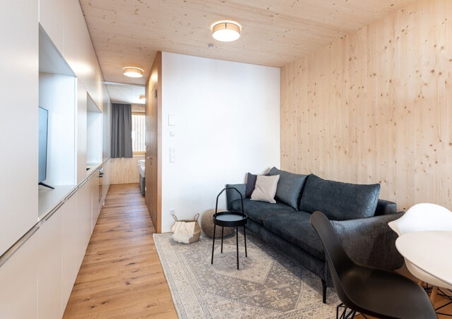 Erstklassiges Wohnen auf 33 m²: Moderne 2-Zimmer Vollholz Wohnung mit Balkon, Stellplatz und Fußbodenheizung in Au!