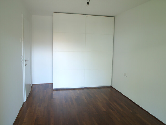 Zentrums- und grenznahe Wohnung mit TG in sehr gutem Zustand