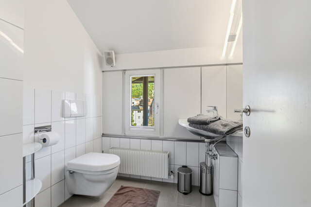 Vielseitige Liegenschaft mit Gewerbefläche und zwei Wohneinheiten in zentraler Lage!