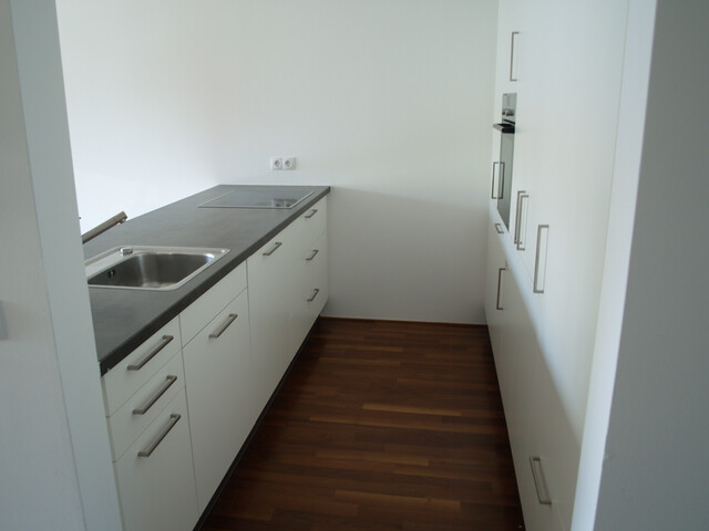 Zentrums- und grenznahe Wohnung mit TG in sehr gutem Zustand