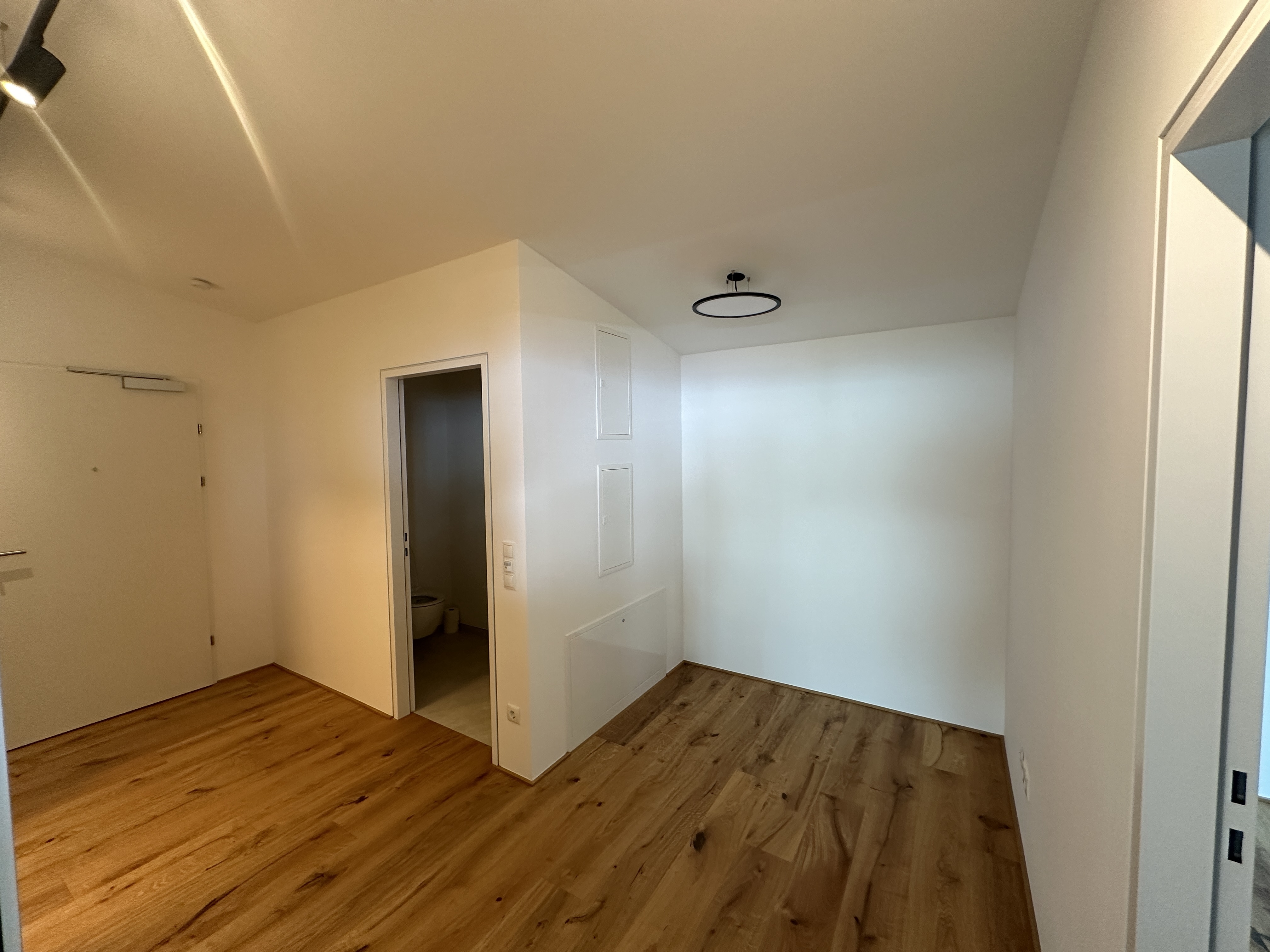 Exklusive Dachgeschosswohnung mit großer überdachter Veranda und atemberaubender Aussicht