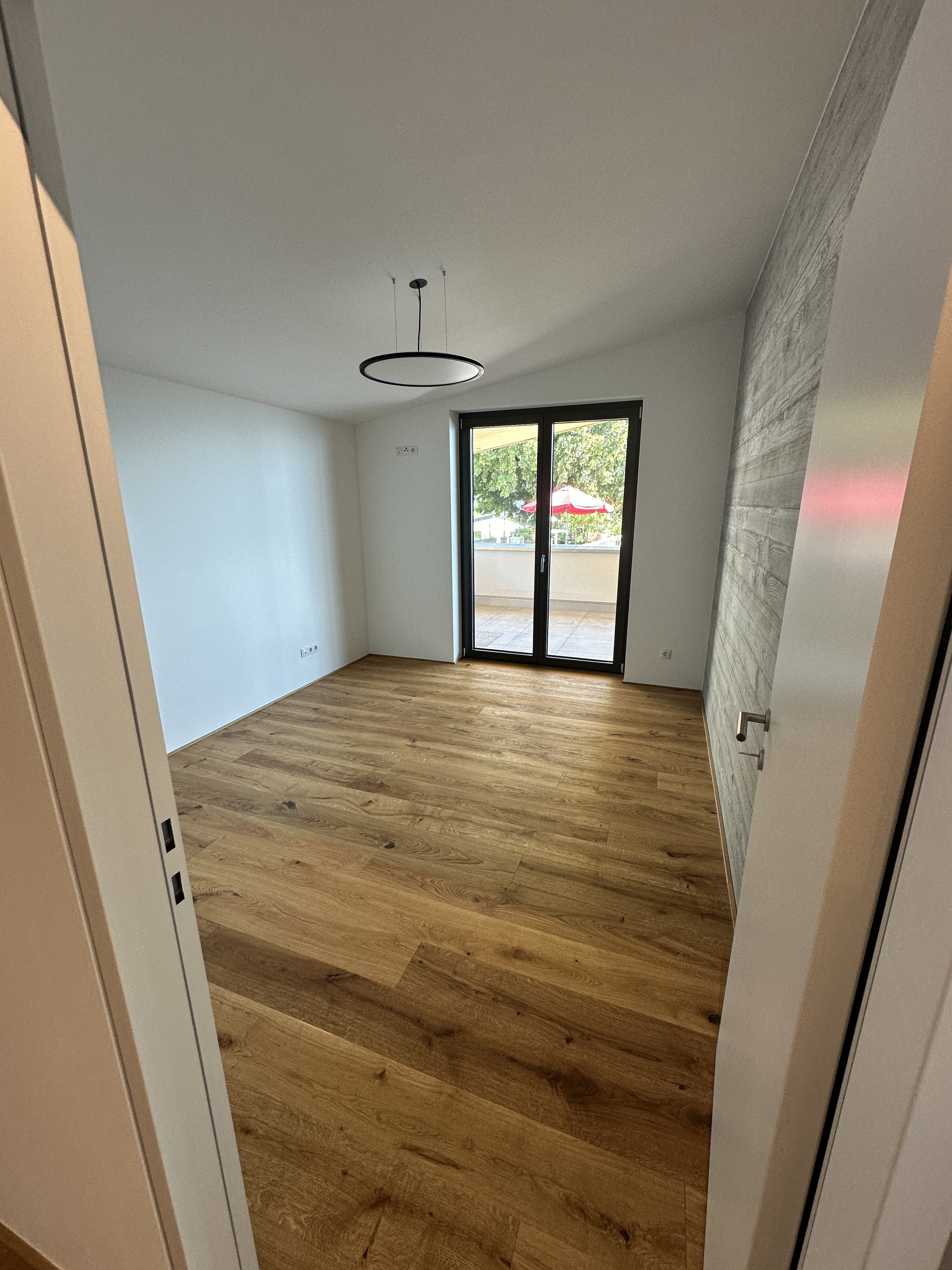 Exklusive Dachgeschosswohnung mit großer überdachter Veranda und atemberaubender Aussicht