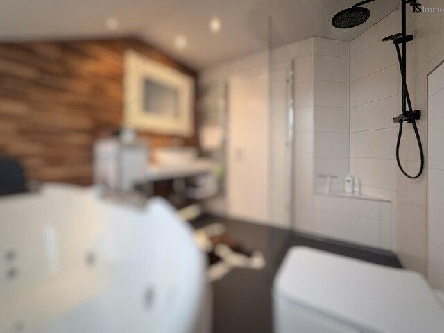 Nüziders: Einfamilienhaus mit Garten - Premium-Immobilie in Nüziders–Wohnjuwel mit Wintergarten, Wellnessbereich & Traumgarten