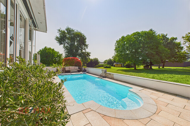 Exklusive Wohlfühloase – Elegantes Haus mit Gartenidylle