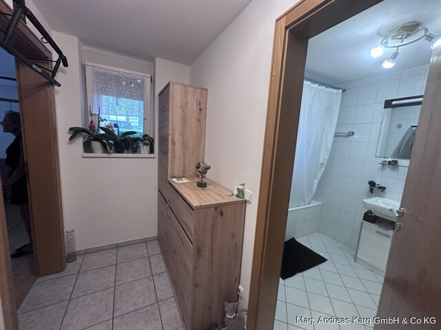 2-ZIMMER-GARTENWOHNUNG MIT TIEFGARAGENPLATZ