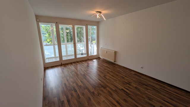 2-Zimmer-Wohnung mit Wintergarten und Tiefgaragenplatz in ruhiger Lage