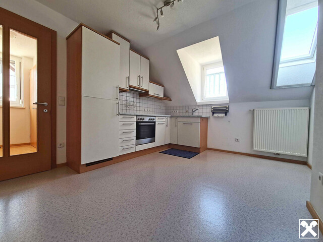 3,5 Zimmer-Dachgeschosswohnung mit Gartenanteil in Kennelbach!