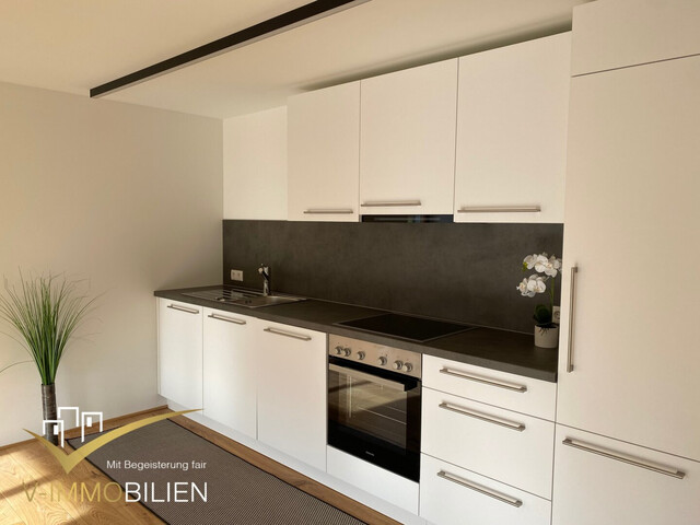 Moderne 2 Zimmer Wohnung mit Gemeinschaftsgarten und KFZ-Stellplatz