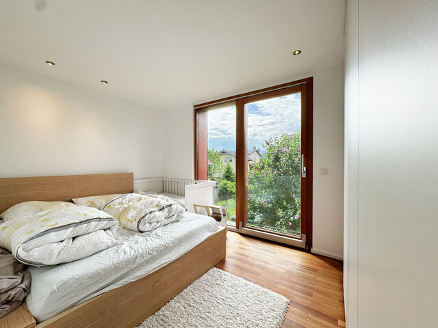 Hochwertige 3-Zimmerwohnung mit Gartenanteil