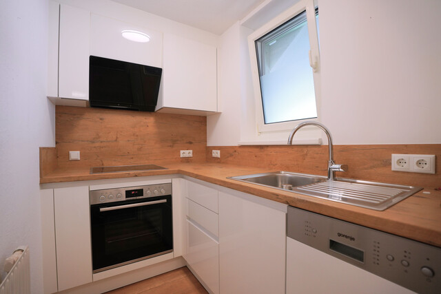 2-Zimmer-Wohnung mit großer Dachterrasse und Tiefgaragenplatz