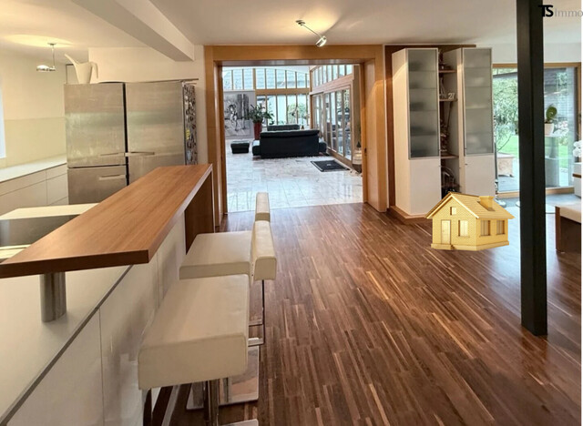 Nüziders: Einfamilienhaus mit Garten - Premium-Immobilie – Wohnjuwel mit Wintergarten, Wellnessbereich & Traumgarten