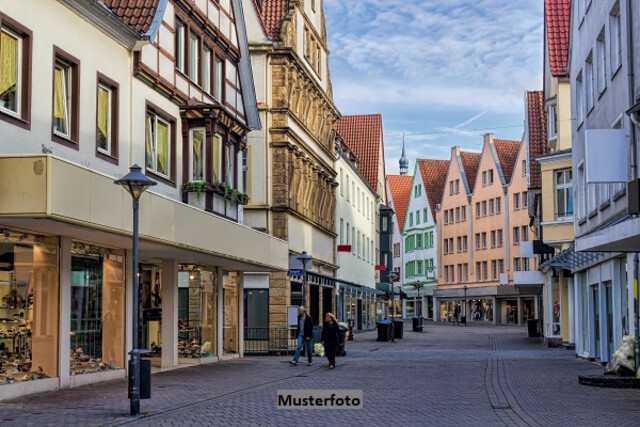 L-förmiges Wohn- und Geschäftshaus: Stadtleben & Vielfalt in Wien