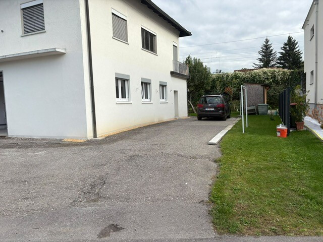 DREIZIMMERGARTENWOHNUNG mit Garage, 4 Stellplätzen, 16 m² Terrasse, 120 m² Garten und Abstellraum
