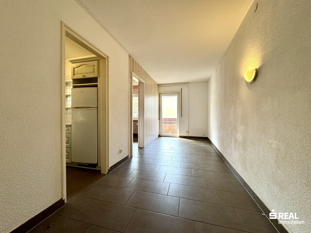 4-Zimmer-Wohnung mit Balkon & Garagenbox in ruhiger Lage