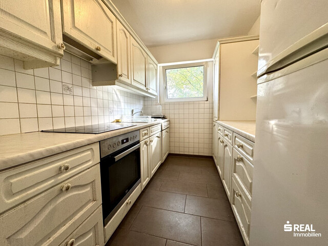 4-Zimmer-Wohnung mit Balkon & Garagenbox in ruhiger Lage