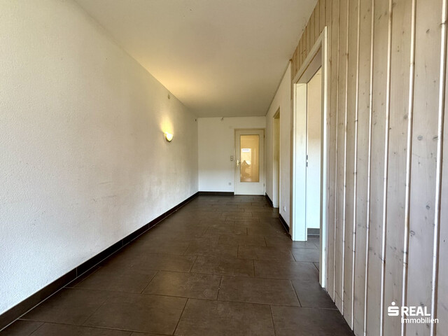 4-Zimmer-Wohnung mit Balkon & Garagenbox in ruhiger Lage