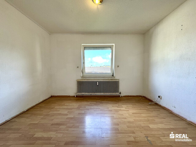 4-Zimmer-Wohnung mit Balkon & Garagenbox in ruhiger Lage