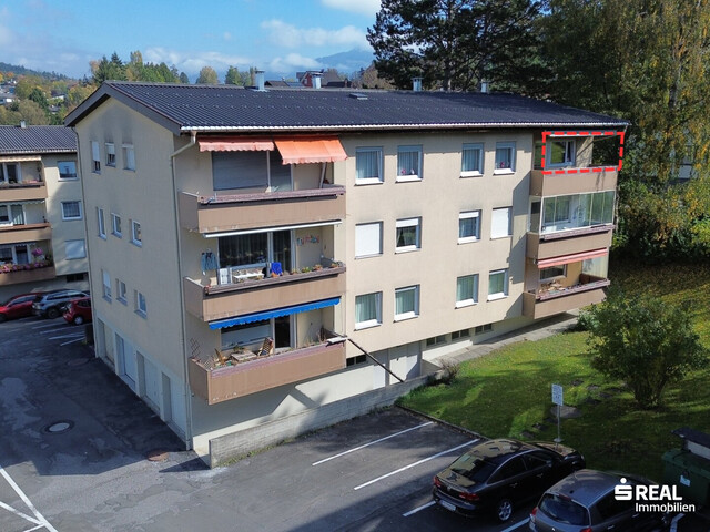 4-Zimmer-Wohnung mit Balkon & Garagenbox in ruhiger Lage