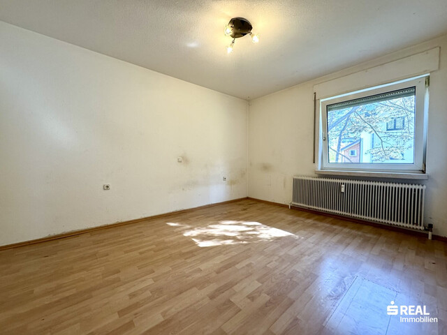 4-Zimmer-Wohnung mit Balkon & Garagenbox in ruhiger Lage