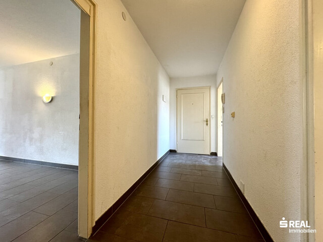 4-Zimmer-Wohnung mit Balkon & Garagenbox in ruhiger Lage