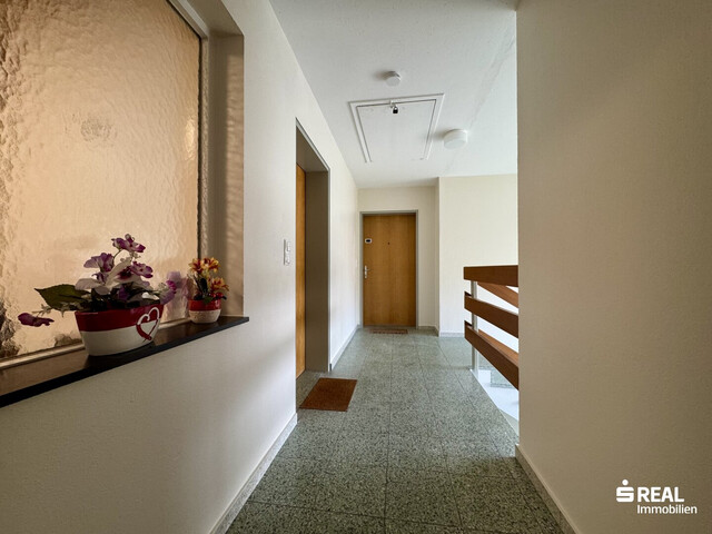 4-Zimmer-Wohnung mit Balkon & Garagenbox in ruhiger Lage