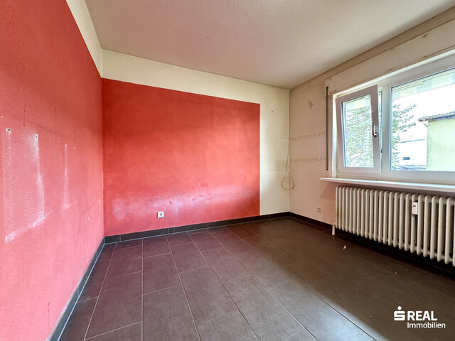 4-Zimmer-Wohnung mit Balkon & Garagenbox in ruhiger Lage