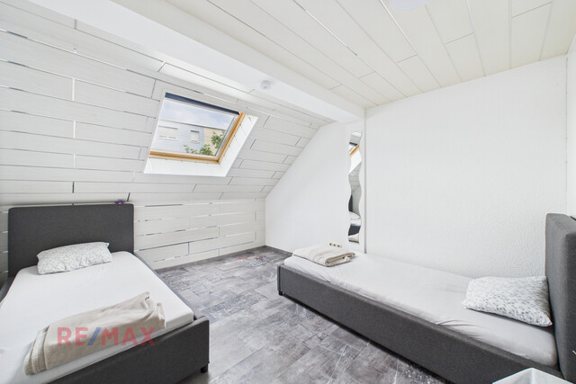 Zinshaus mit Pizzeria und bebaubarer Grundstücksreserve – Alles an einem Standort