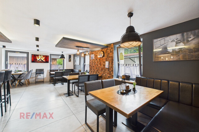 Zinshaus mit Pizzeria und bebaubarer Grundstücksreserve – Alles an einem Standort