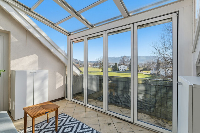 charmante und helle 4,5-Zimmer-Wohnung in Lauterach: Wintergarten mit Blick ins Grüne!