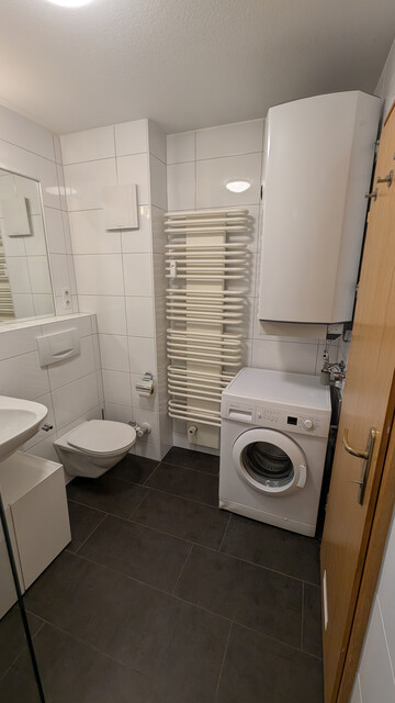 2-Zimmer-Wohnung mit Wintergarten und Tiefgaragenplatz in ruhiger Lage