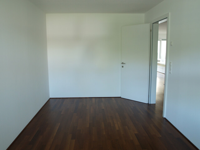 Zentrums- und grenznahe Wohnung mit TG in sehr gutem Zustand