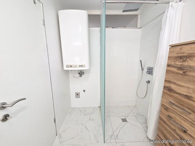 4,5-Zimmer-Wohnung mit großzügigem Balkon sowie Loggia und Tiefgaragenplatz