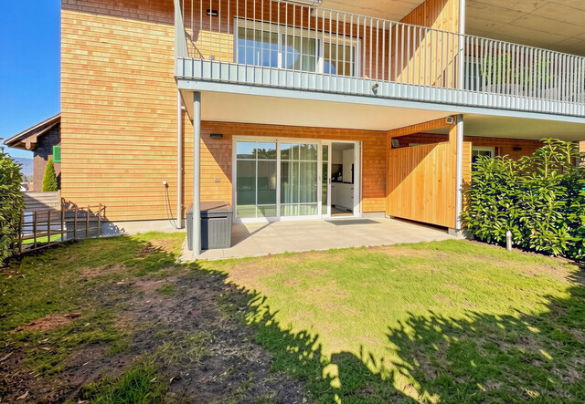 Erstklassiges Wohnerlebnis mit Garten, Stil und zwei Tiefgaragenplätzen