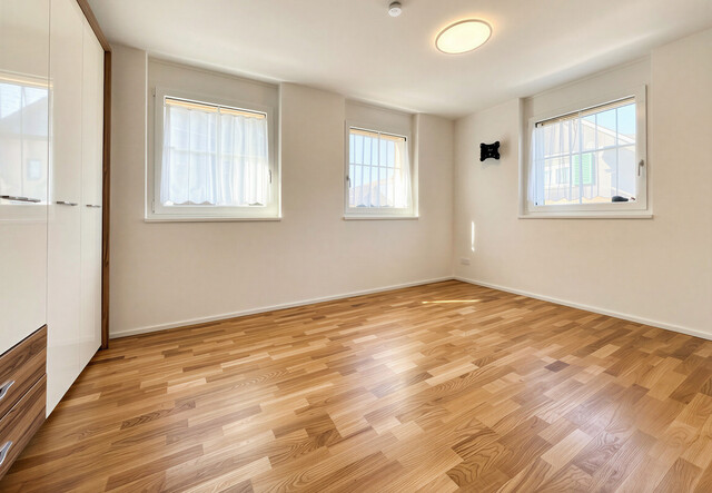 Erstklassiges Wohnerlebnis mit Garten, Stil und zwei Tiefgaragenplätzen