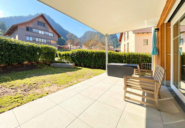 Erstklassiges Wohnerlebnis mit Garten, Stil und zwei Tiefgaragenplätzen